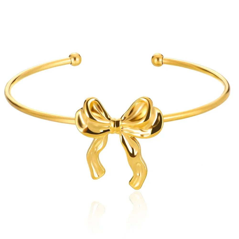 Brazalete Fino Dorado con Cuenta de Acero