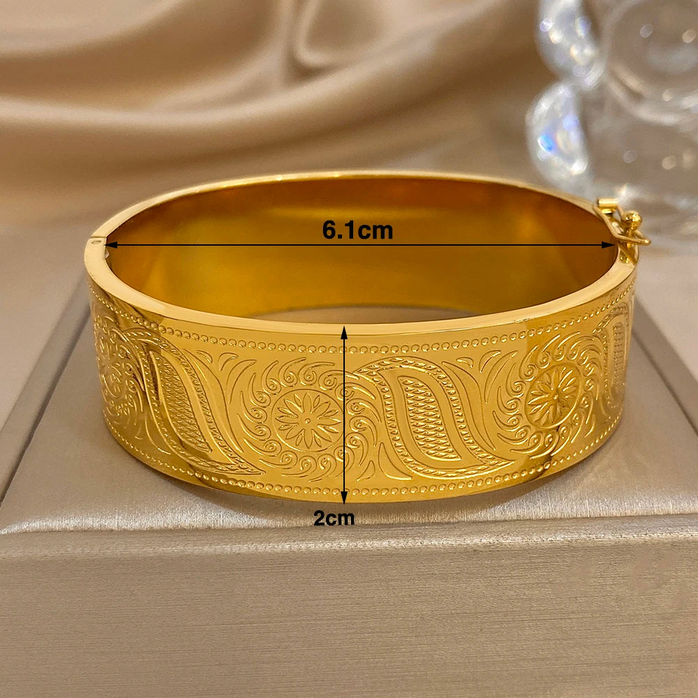 Brazalete Dorado de Acero con Hojas de Sol