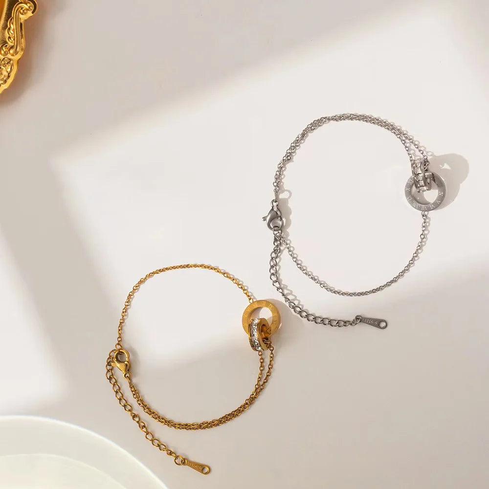 Pulsera Dorada de Acero con Números Romanos