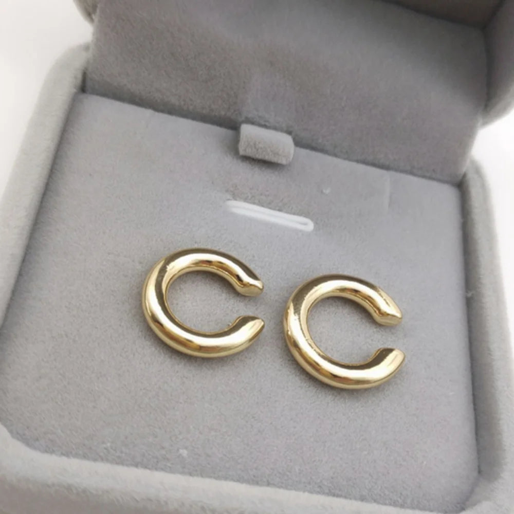 Aretes Clip Redondos Dorados Sin Perforación — Estilo C para Mujer